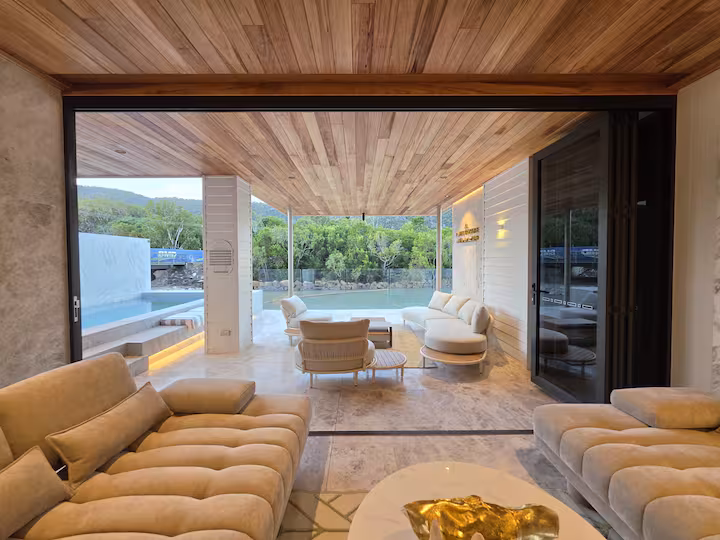 Indoor-outdoor living and pool at Prestige