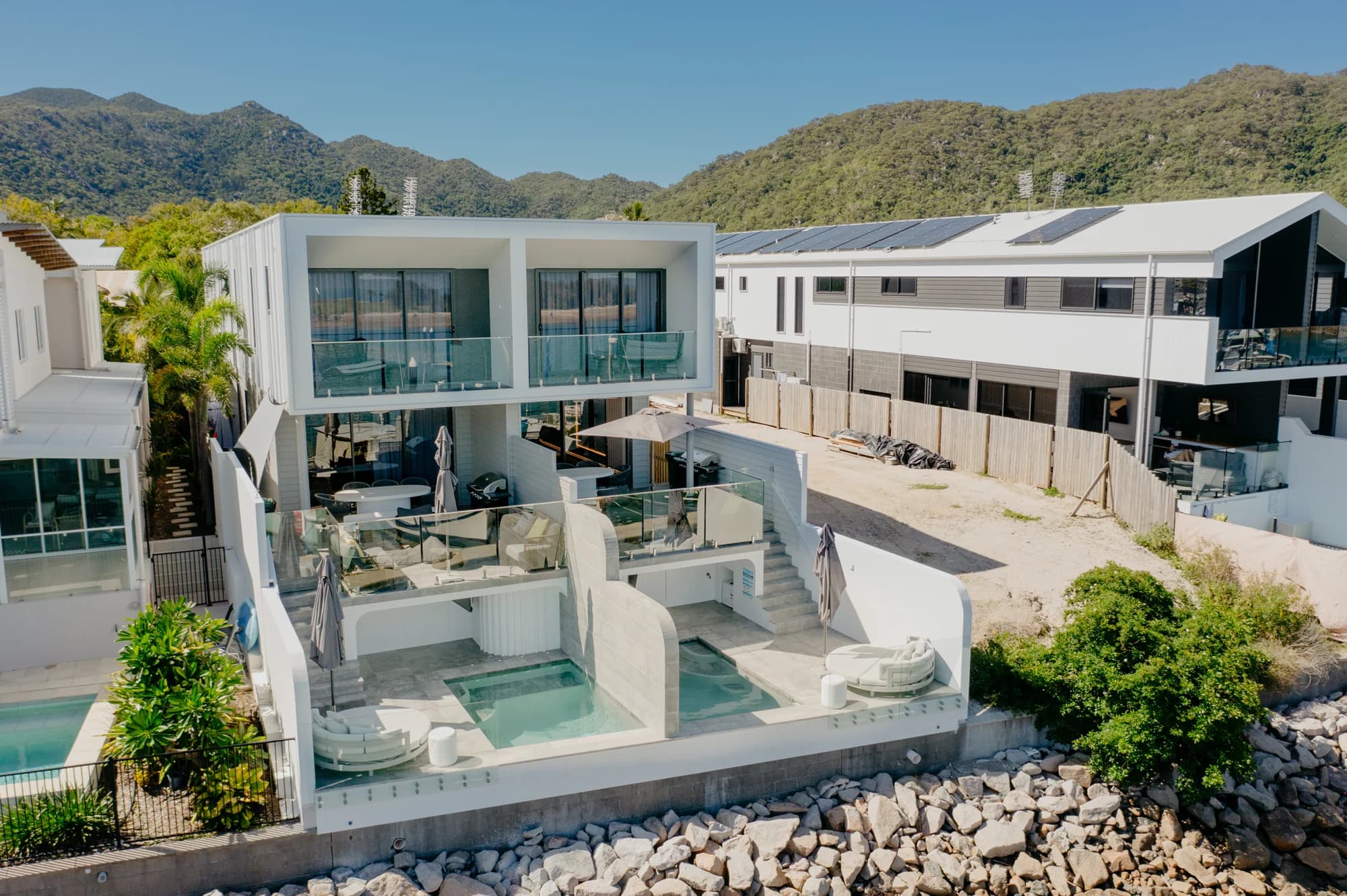 Lavish and its private pool on the Nelly Bay waterfront