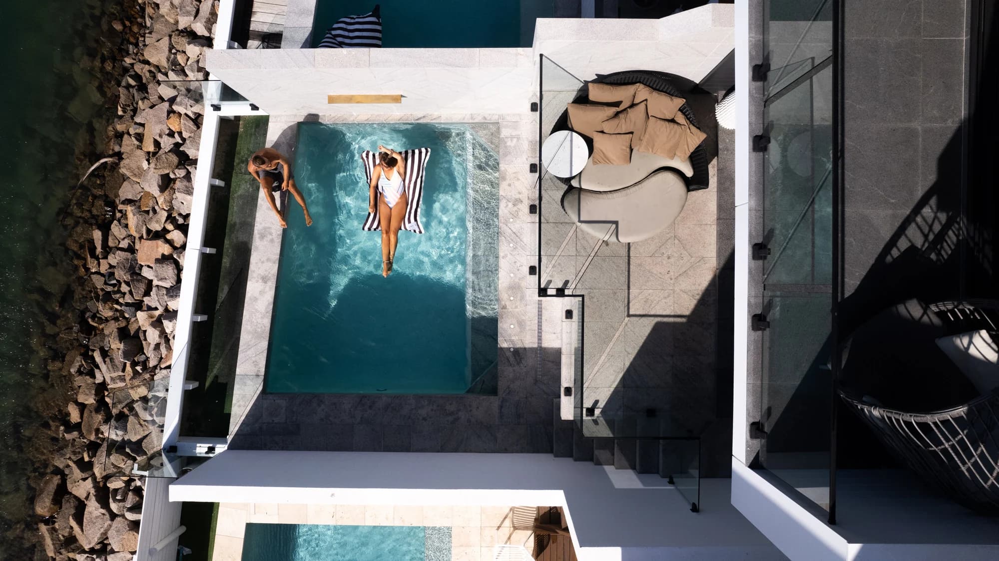 The private pool and waterfront terrace at No. 1